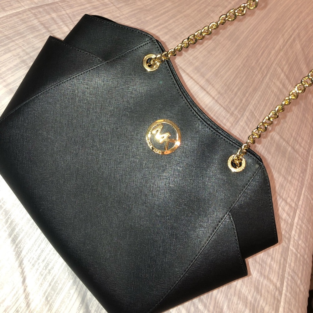 SOLD Medium sized black and gold Michael Kors bag